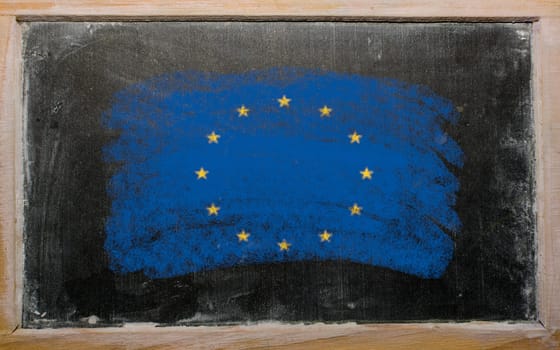 Chalky european union flag painted with color chalk on old blackboard
