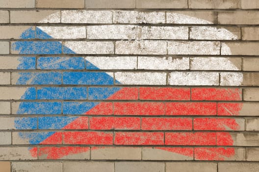 Chalky czech flag painted with color chalk on grunge old brick wall