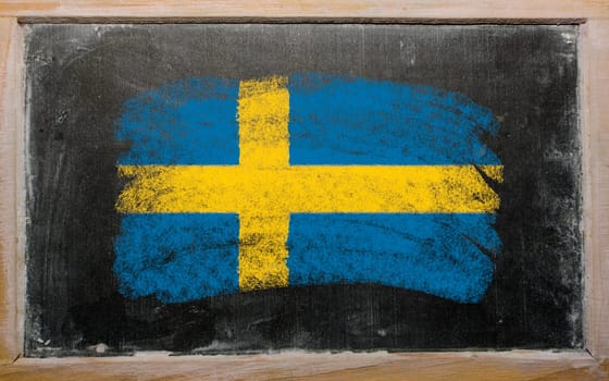 Chalky argentinian flag painted with color chalk on old blackboard