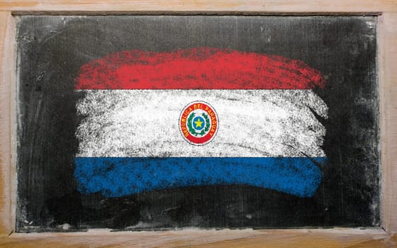 Chalky paraguay flag painted with color chalk on old blackboard