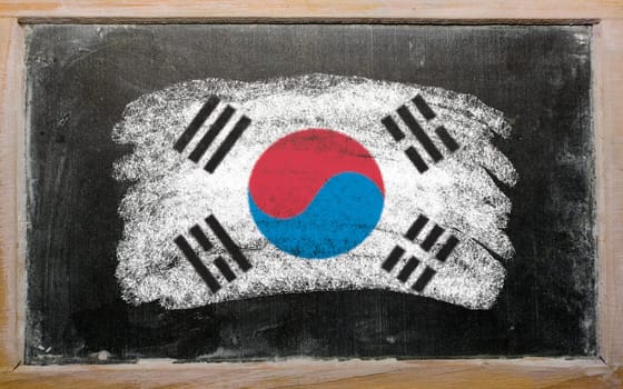 Chalky South Korean flag painted with color chalk on old blackboard