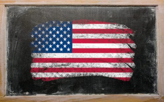 Chalky united states of america flag painted with color chalk on old blackboard