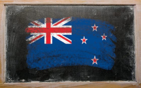 Chalky new zealand flag painted with color chalk on old blackboard