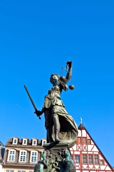 Statue of Lady Justice in front of the Romer in Frankfurt - Germany