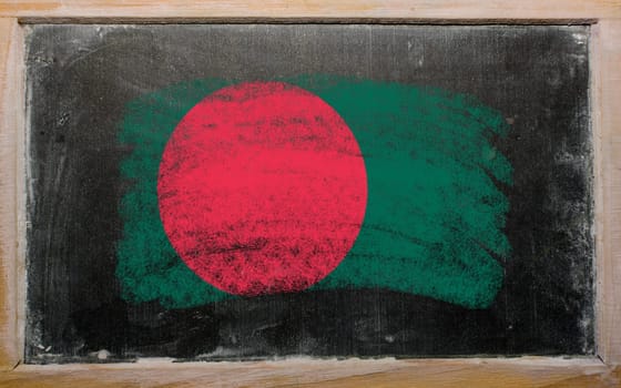 Chalky bangladesh flag painted with color chalk on old blackboard