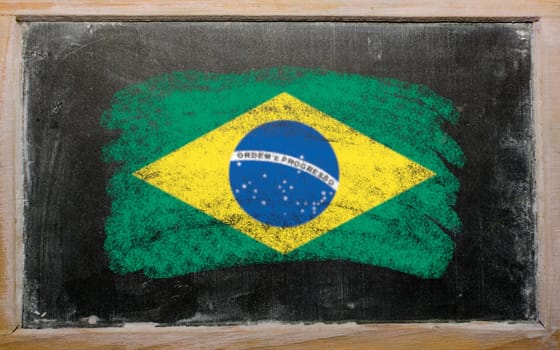 Chalky Brazilian flag painted with color chalk on old blackboard
