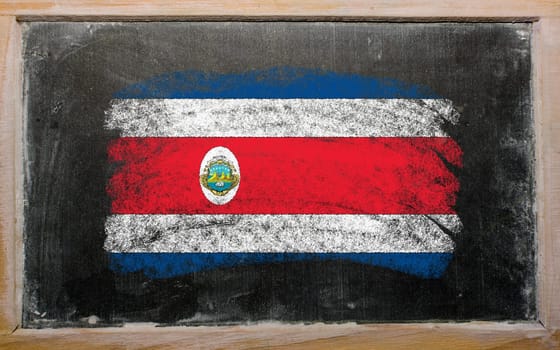 Chalky costa rica flag painted with color chalk on old blackboard