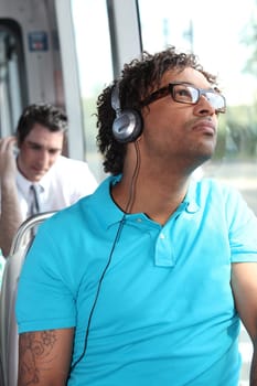 young man in public transportation