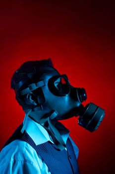 Man wearing a gas mask for protection against pollution