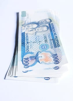 a stack of philippines peso, in one thousand denomination