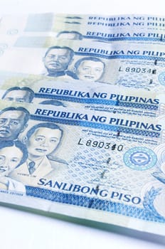a stack of philippines peso, in one thousand denomination