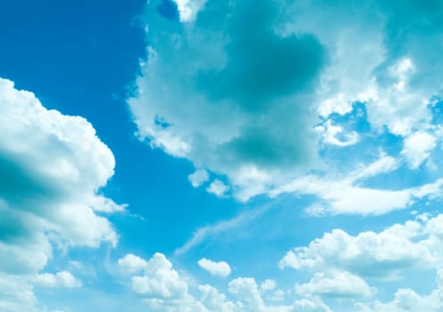 dramatic blue sky with clouds, for backgrounds.