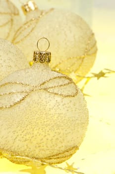 Christmas ball baubles with silver and gold decoration.