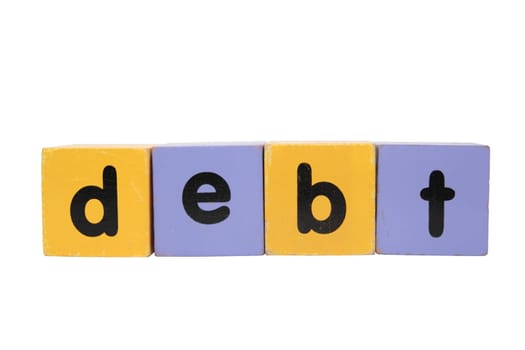 assorted childrens toy letter building blocks against a white background that spell debt with clipping path