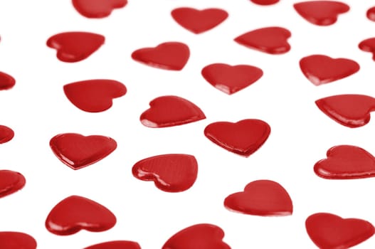 Red hearts confetti isolated on white background
