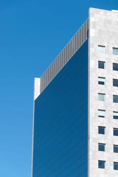 skyscraper mirrors with blue sky in Italy