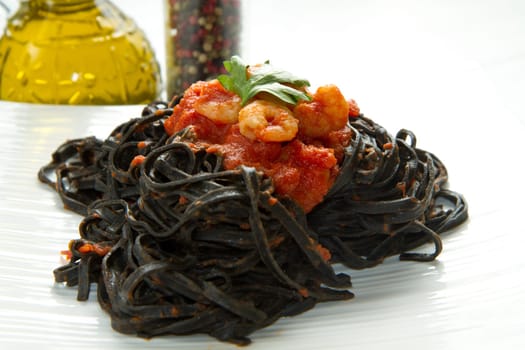 black pasta  with tomatoes sauce and shrimp