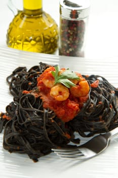 black pasta  with tomatoes sauce and shrimp