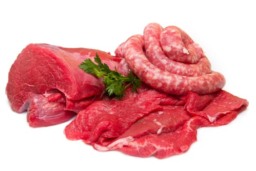 Fresh butcher cut meat assortment garnished
