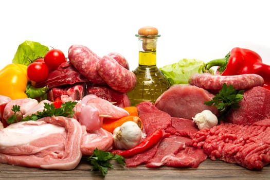 Fresh butcher cut meat assortment garnished