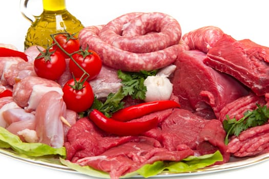 Fresh butcher cut meat assortment garnished