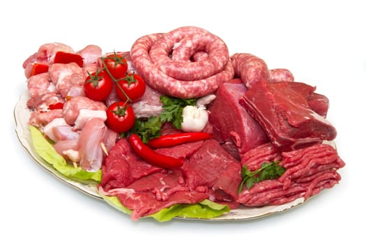 Fresh butcher cut meat assortment garnished