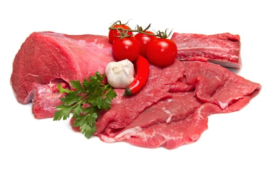 Fresh butcher cut meat assortment garnished