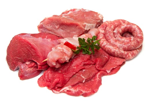 Fresh butcher cut meat assortment garnished