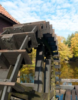 closeup of a wheel of an old water powered sawmill in the Netherlands