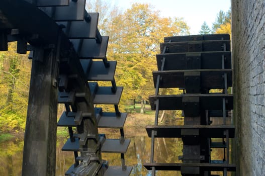 closeup of the wheels of an old water powered sawmill in the Netherlands
