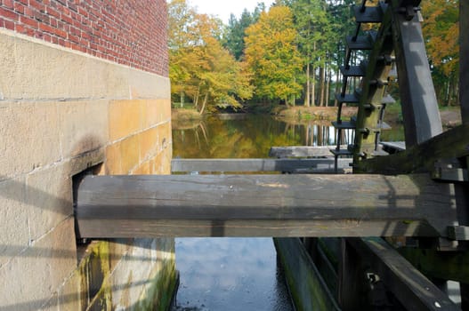 axle and wheel of an old water powered sawmill in the Netherlands