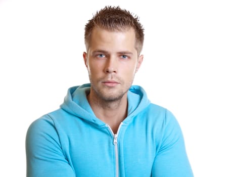 Young handsome guy wearing a hoodie, on white
