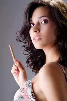Beautiful brunette having an arrogant expression