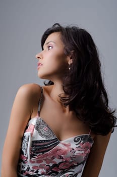 Beautiful brunette having an arrogant expression