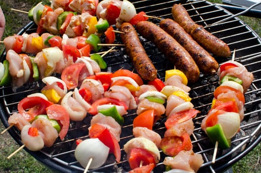 Skewers cooking on barbeque