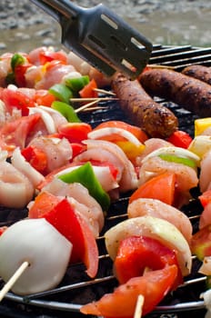 Skewers cooking on barbeque