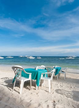 dining table on a tropical beach