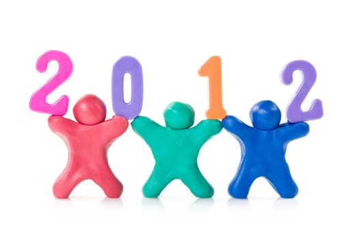 plasticine people hold number  2012 . new year concept