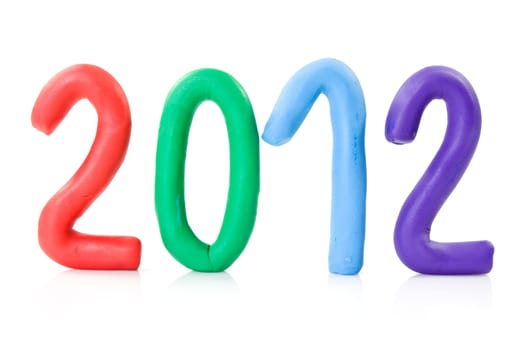 plasticine figures 2012 over a white background. new year concept