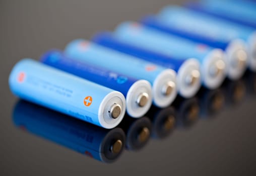 AA size NiMH batteries in a row with focus on the first one