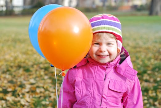 Girl with balloons