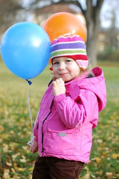 Girl with balloons