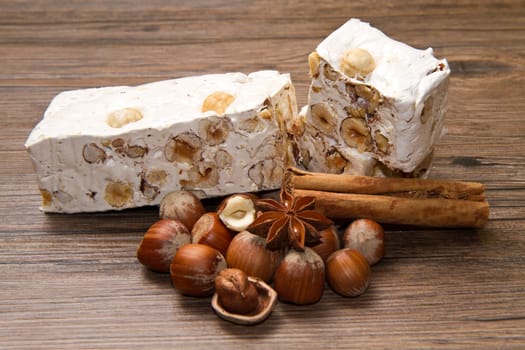 nougat with hazelnut on wooden table