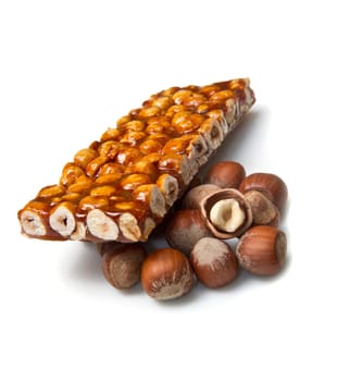 hazelnut brittle on white close up