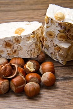 nougat with hazelnut on wooden table