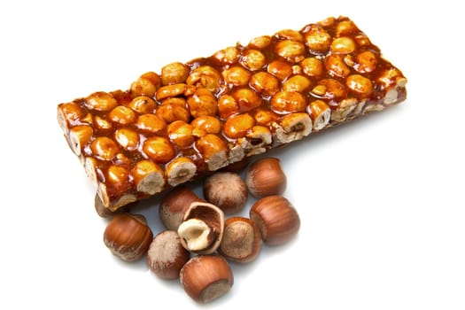 hazelnut brittle on white close up