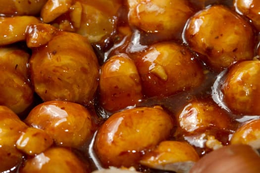 hazelnut brittle on white close up