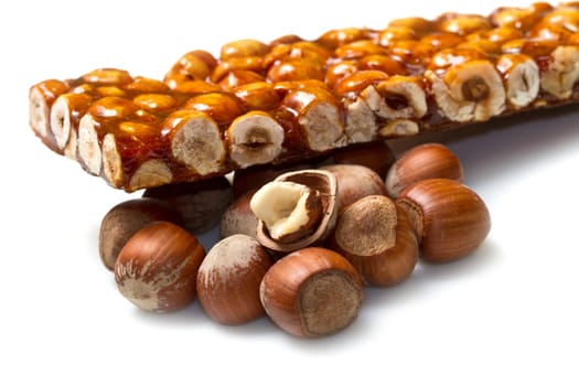 hazelnut brittle on white close up