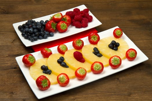 pineapple slices with berries