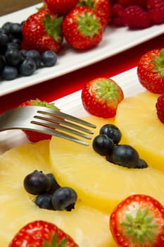 pineapple slices with berries